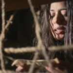 EP101_ Lilith reading scroll