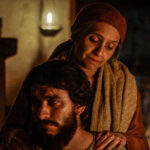 EP201_ John and Mom hands on shoulders