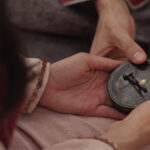 EP403-HoldingSundial_16x9