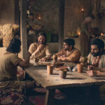 EP404-LaughingAtTable